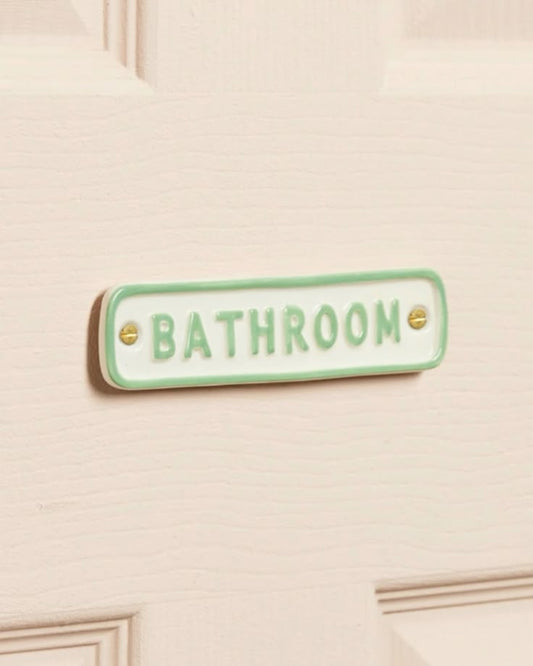 Señal de baño de cerámica